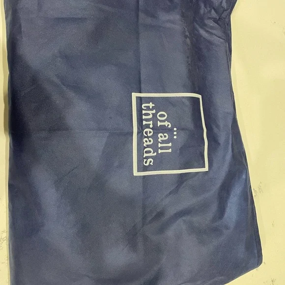 Of All Threads overnight bag with suit jacket garment bag